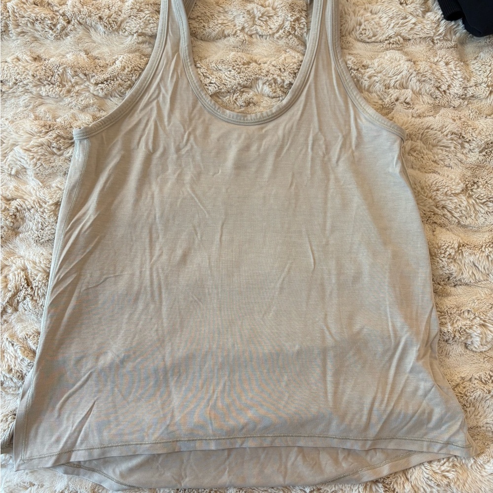 lululemon athletica beige and black tanks